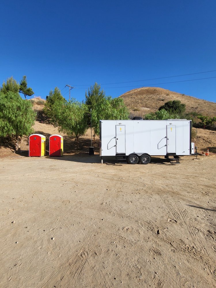 Restroom trailer and portable units on a film location
